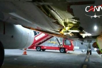 فرود بی خطر هواپیمای هندی پس از برخورد به انتهای باند 