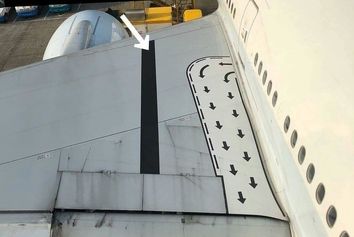 نوار مشکی قرار گرفته بر روی بالهای هواپیمای بویینگ ۷۷۷ چیست؟